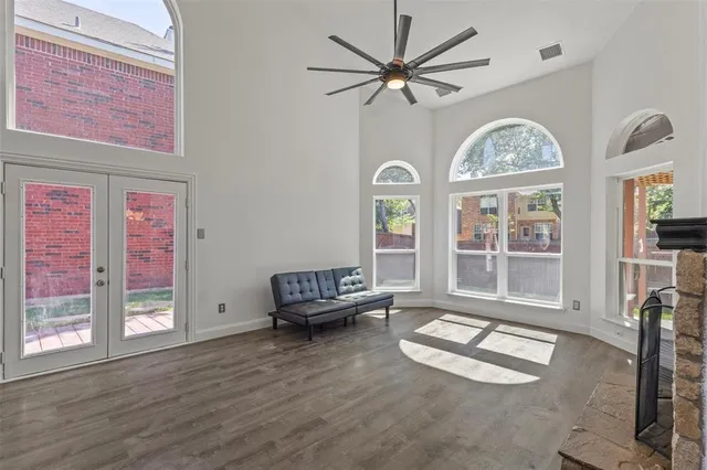 a bathroom with a granite countertop sink a mirror and vanity