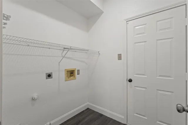 a kitchen with stainless steel appliances granite countertop a refrigerator stove and sink