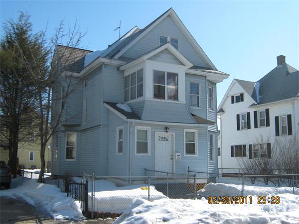 55 Malden Street Springfield, MA 01108 - Photo 1 of 1 a front view of a house with a yard