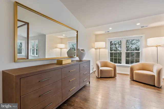 a view of a town with mountains front of house