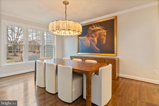 a living room with furniture or fireplace and wooden floor