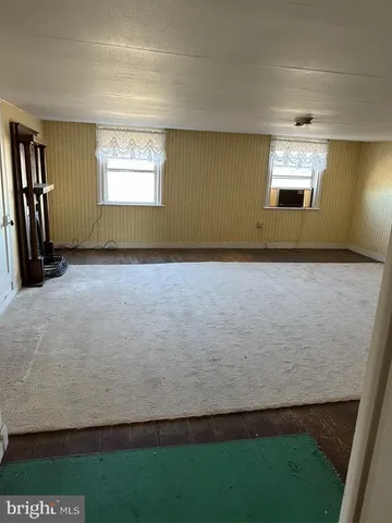 a view of an entryway with a door