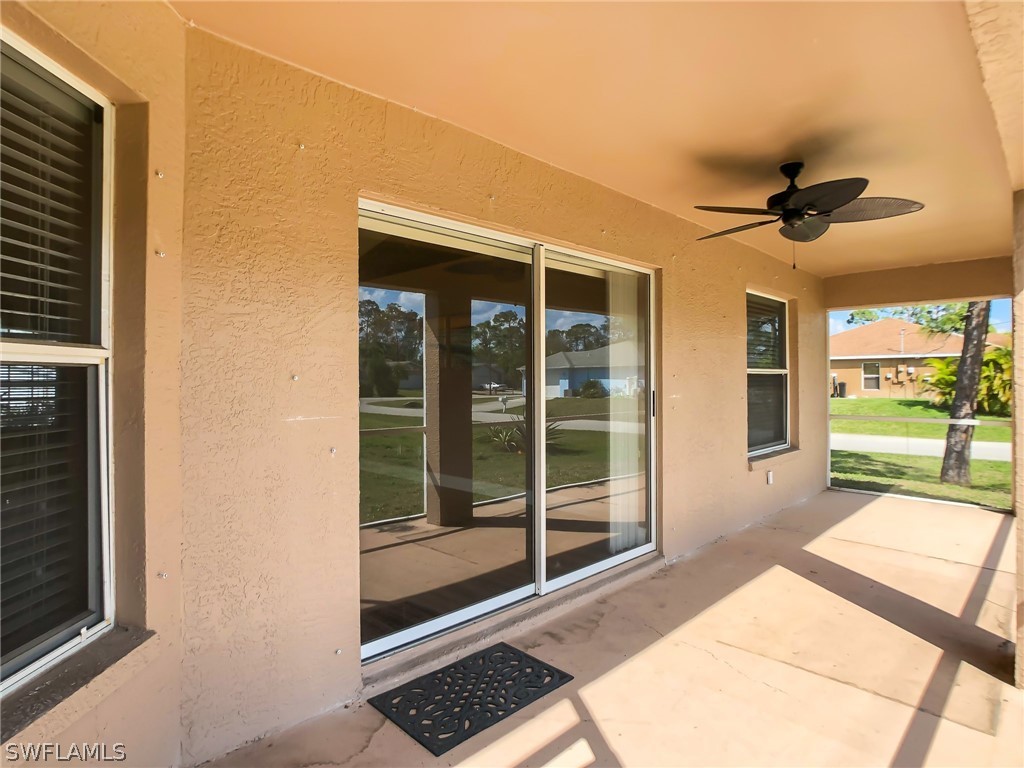 9068 Morris Road Fort Myers, FL 33967 - Photo 24 of 29 a view of a room with a window and a ceiling fan