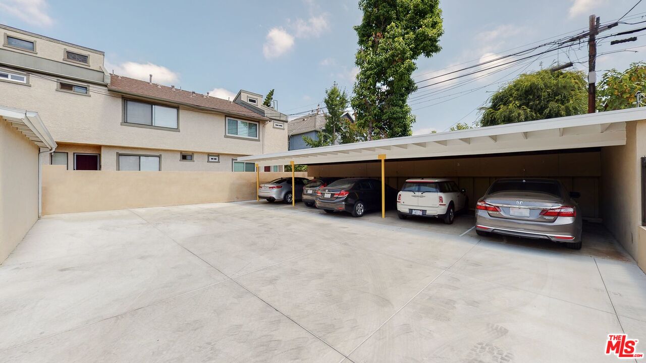 40 South Meridith Avenue, Unit 2 Pasadena, CA 91106 - Photo 13 of 14 a car parked in front of a building