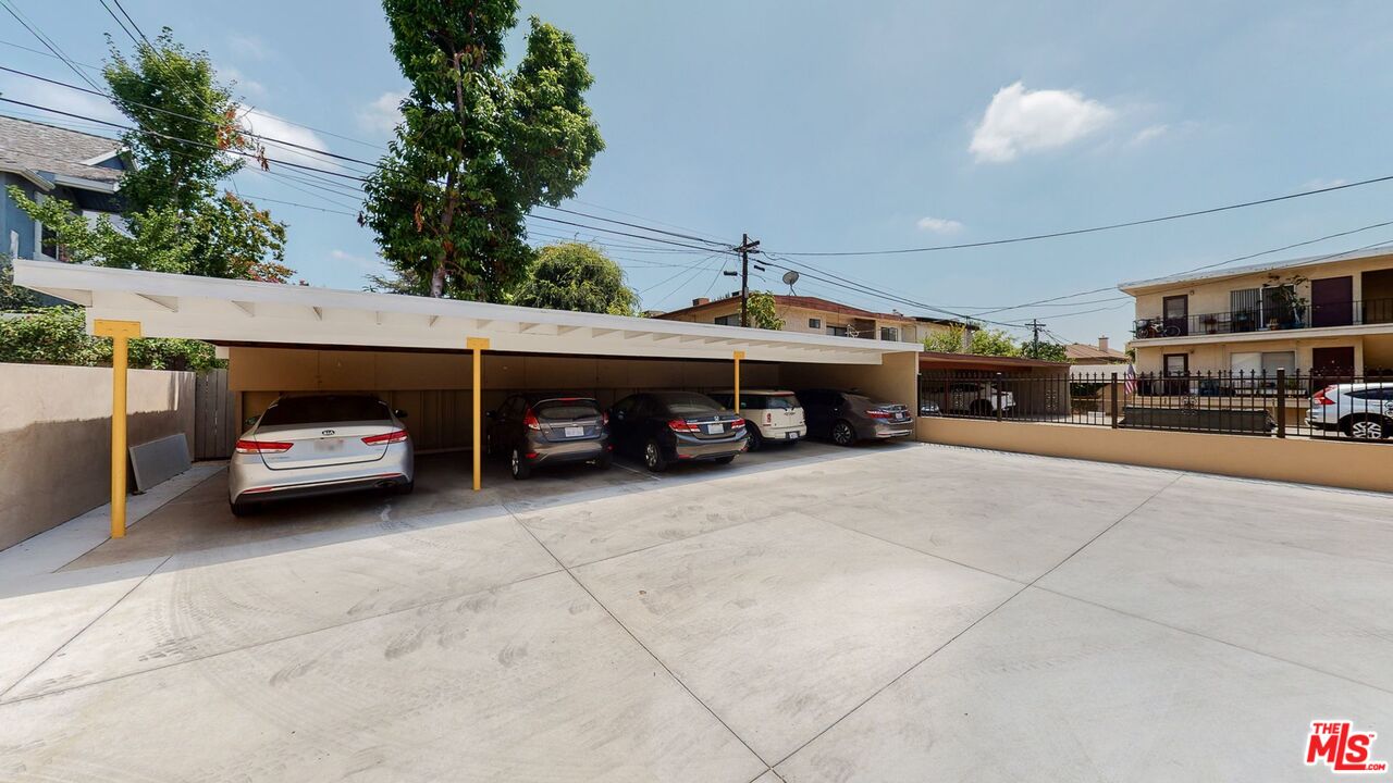 40 South Meridith Avenue, Unit 2 Pasadena, CA 91106 - Photo 14 of 14 a couple of cars parked in parking area of a building