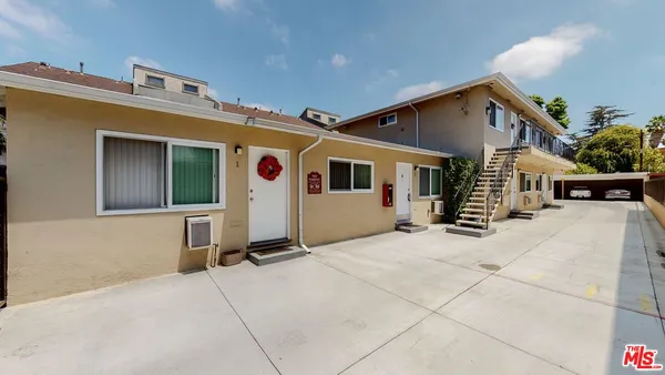 a view of a house with a patio