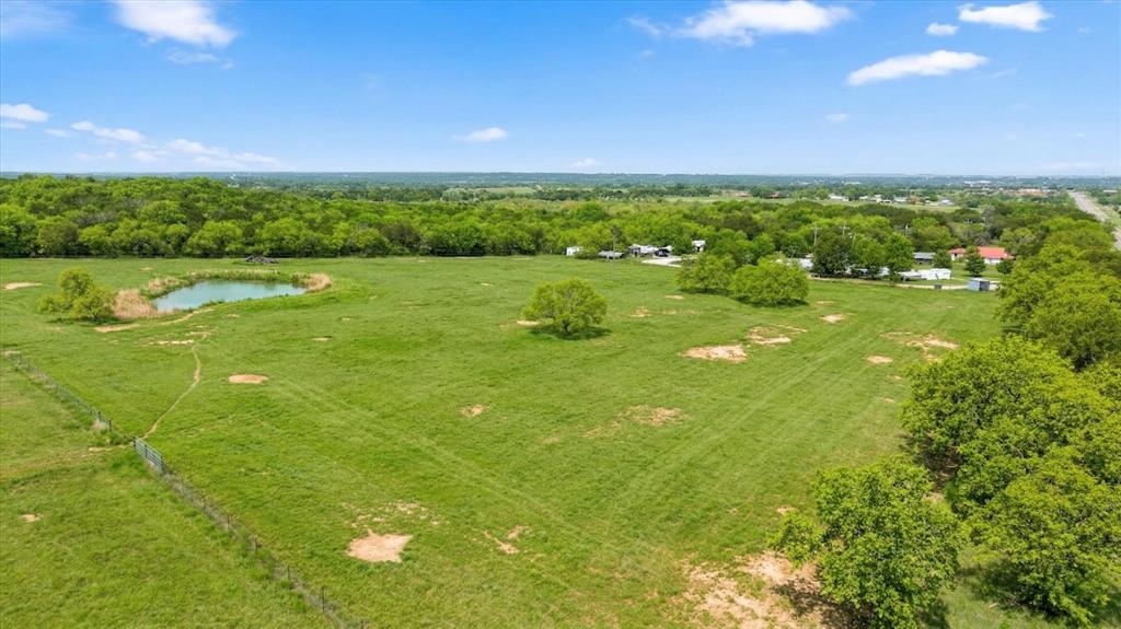 17305 Highway 281 Hico, TX 76457 - Photo 26 of 28 a view of yard with swimming pool and outdoor space