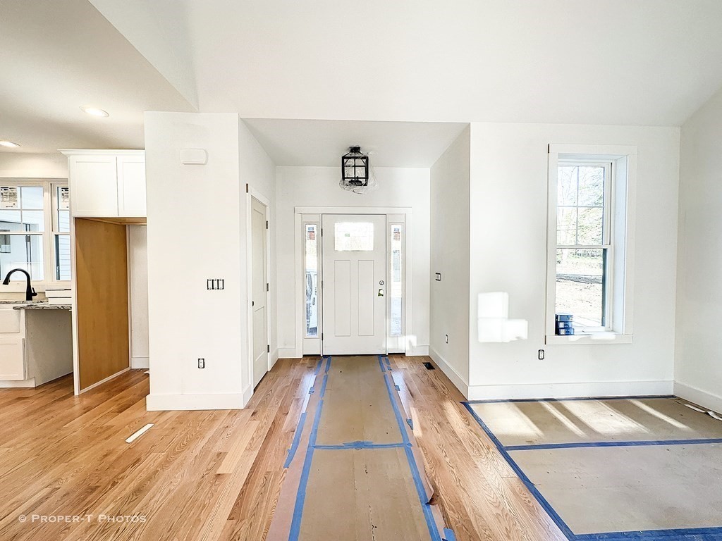 101 Glendale Road Hampden, MA 01036 - Photo 14 of 39 a view of a room with wooden floor and windows