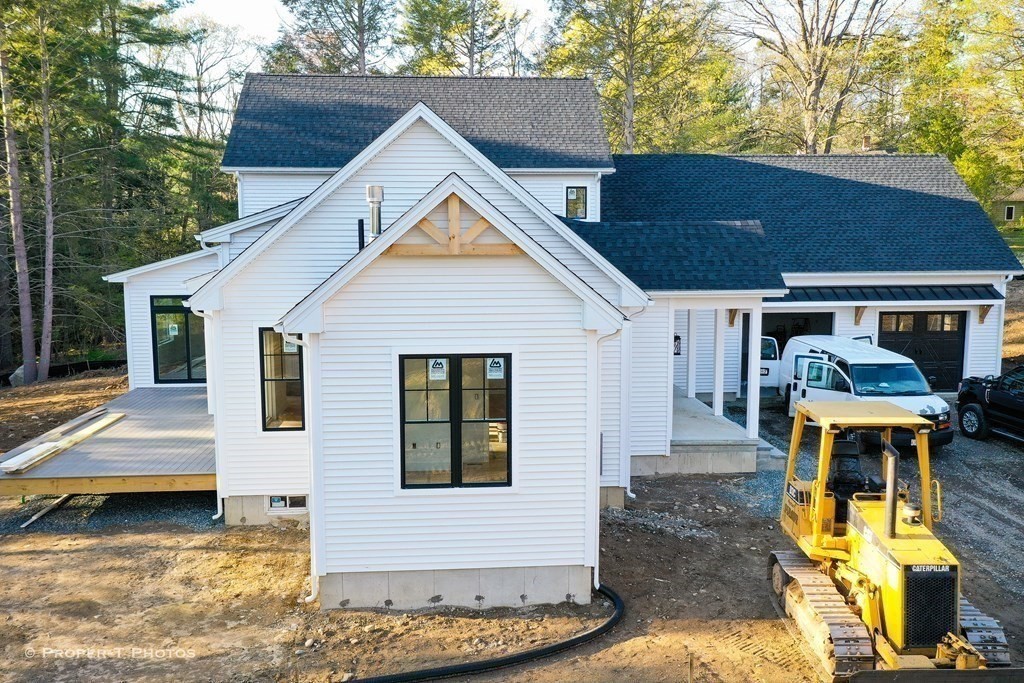 101 Glendale Road Hampden, MA 01036 - Photo 2 of 39 a view of a house with wooden floor and a yard