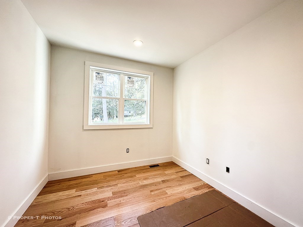 101 Glendale Road Hampden, MA 01036 - Photo 22 of 39 a view of empty room with wooden floor