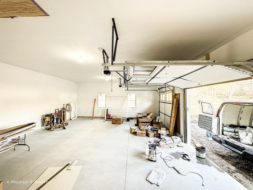 101 Glendale Road Hampden, MA 01036 - Photo 26 of 39 a room with gym equipment and large mirror