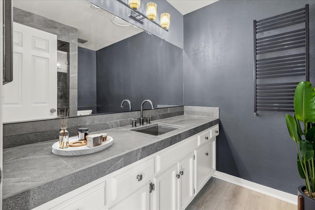 118 Nissen Road, Unit 1 Salinas, CA 93901 - Photo 21 of 39 a bathroom with a sink and a mirror