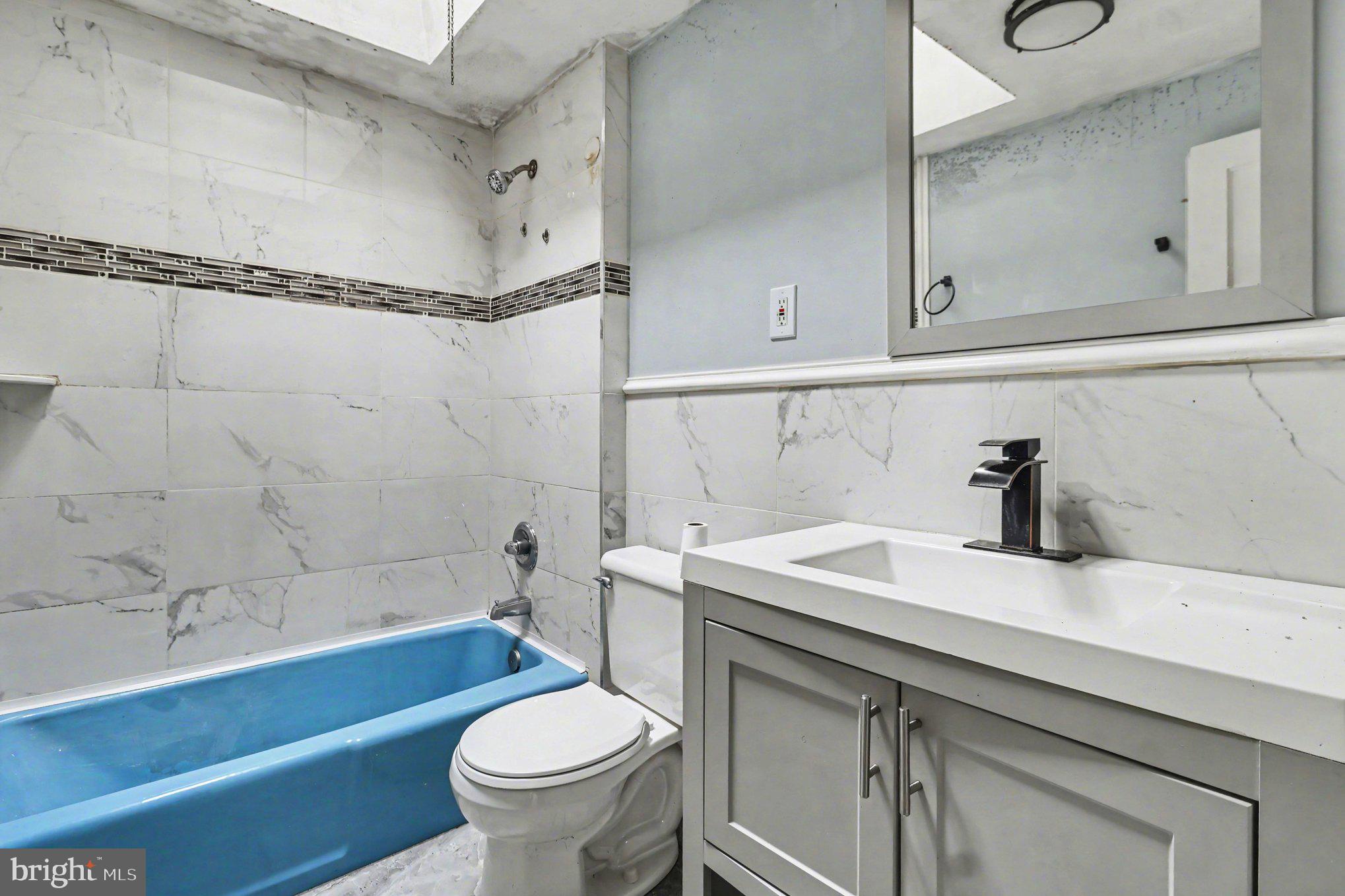 798 Bennington Road Folcroft, PA 19032 - Photo 13 of 28 a bathroom with a sink a toilet and shower