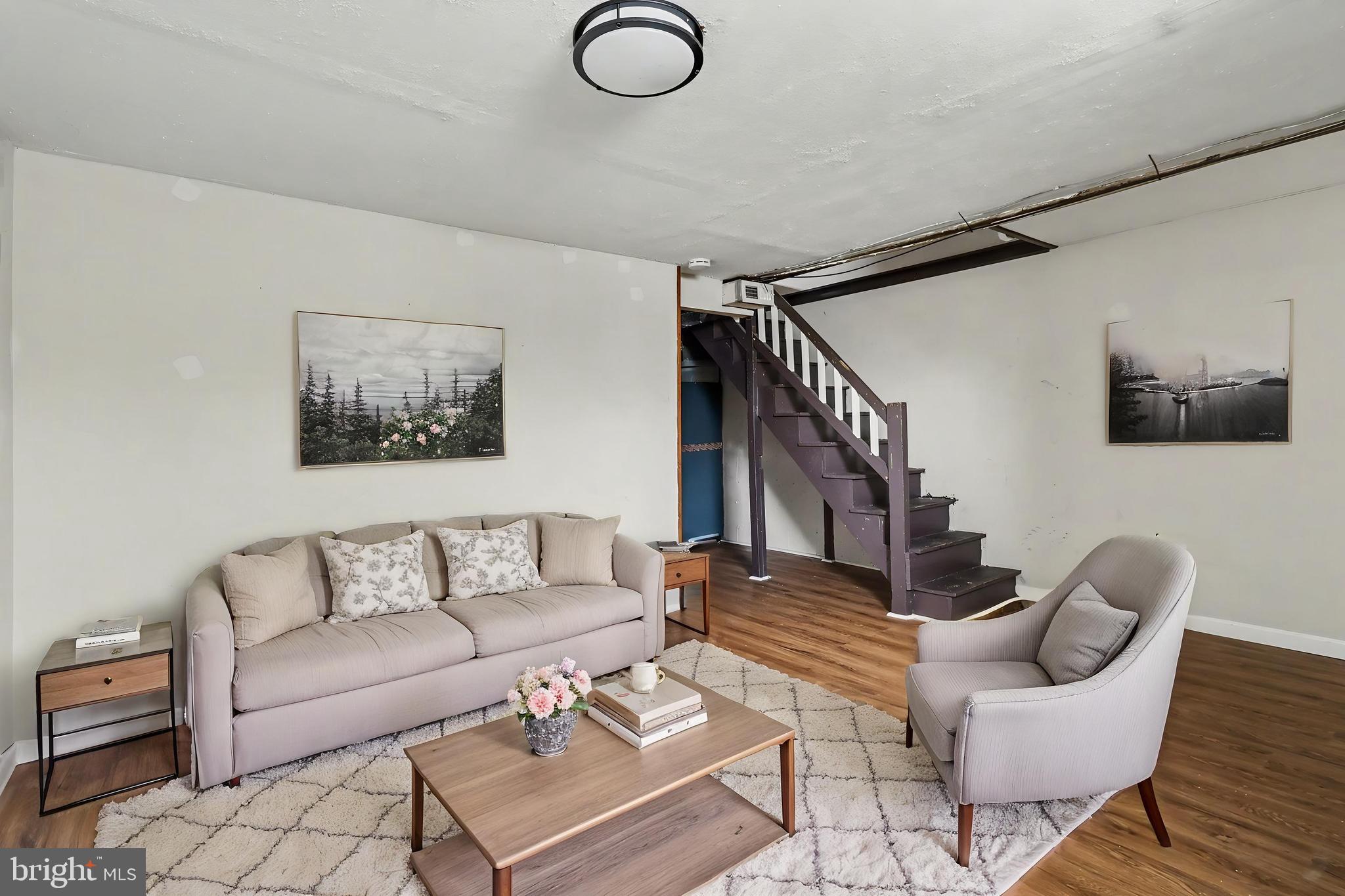 798 Bennington Road Folcroft, PA 19032 - Photo 19 of 28 a living room with furniture and a flat screen tv