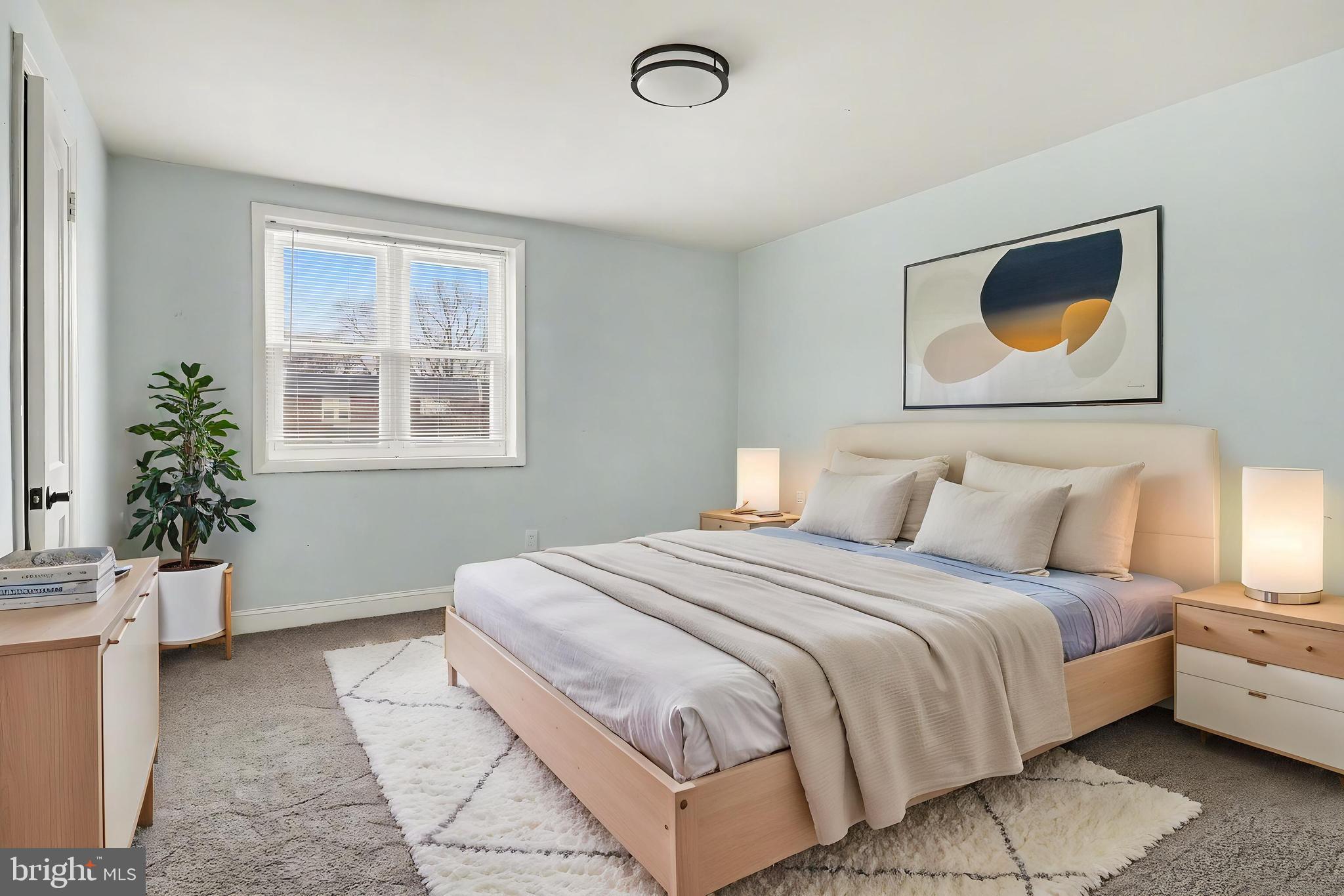 798 Bennington Road Folcroft, PA 19032 - Photo 10 of 28 a bedroom with a bed and a potted plant