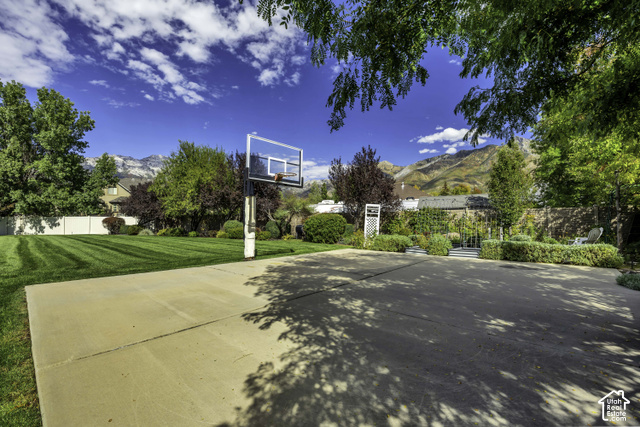 259 Twin River Loop Alpine, UT 84004 - Photo 47 of 61 Expansive concrete sports court with an adjustable basketball hoop on this half acre lot that views the north and east mountains that Alpine nestles up to,