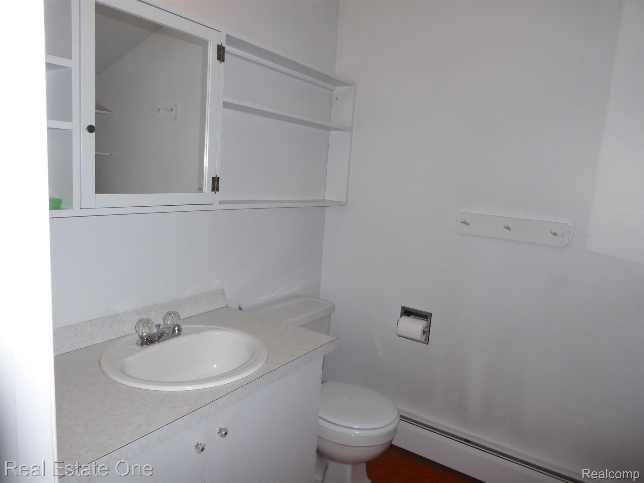 2779 West Wattles Road Troy, MI 48098 - Photo 15 of 23 UPSTAIRS LAV HAS RM FOR A SHOWER