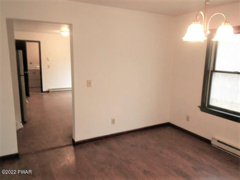 126 Maple Ridge Drive Hawley, PA 18428 - Photo 14 of 40 an empty room with a window