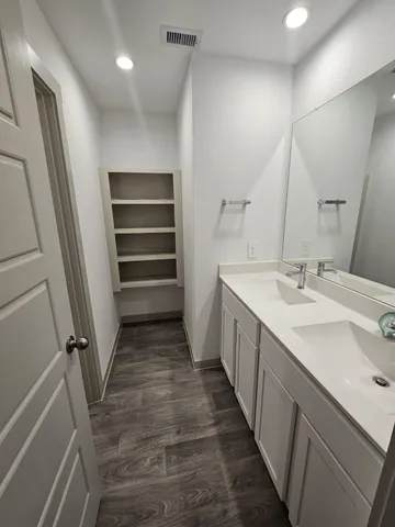 a bathroom with a bathtub and toilet