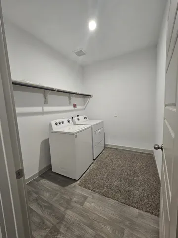 a utility room with washer and dryer
