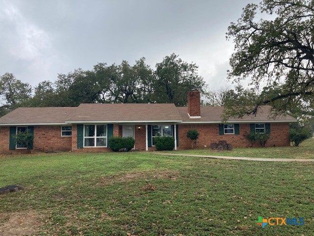 2603 West Main Street Cameron, TX 76520 - Photo 2 of 26 front view of a house with a yard