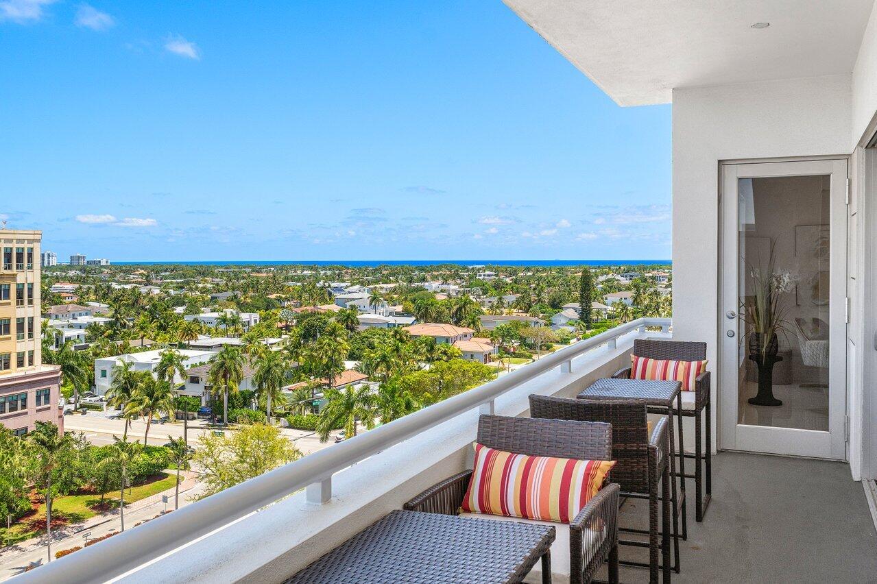 155 East Boca Raton Road, Unit 919 Boca Raton, FL 33432 - Photo 22 of 45 a view of balcony with two chairs and a table