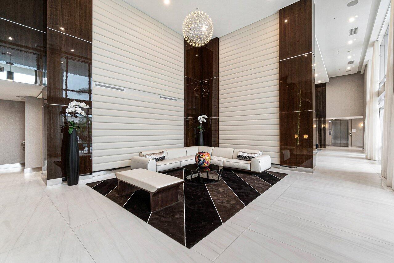 155 East Boca Raton Road, Unit 919 Boca Raton, FL 33432 - Photo 30 of 45 a lobby with furniture and a potted plant