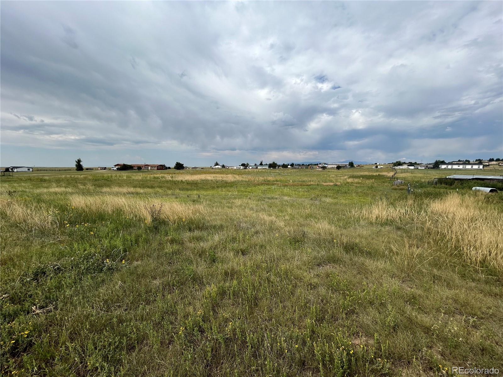 3640 Murr Road Peyton, CO 80831 - Photo 11 of 22 a view of an ocean and beach