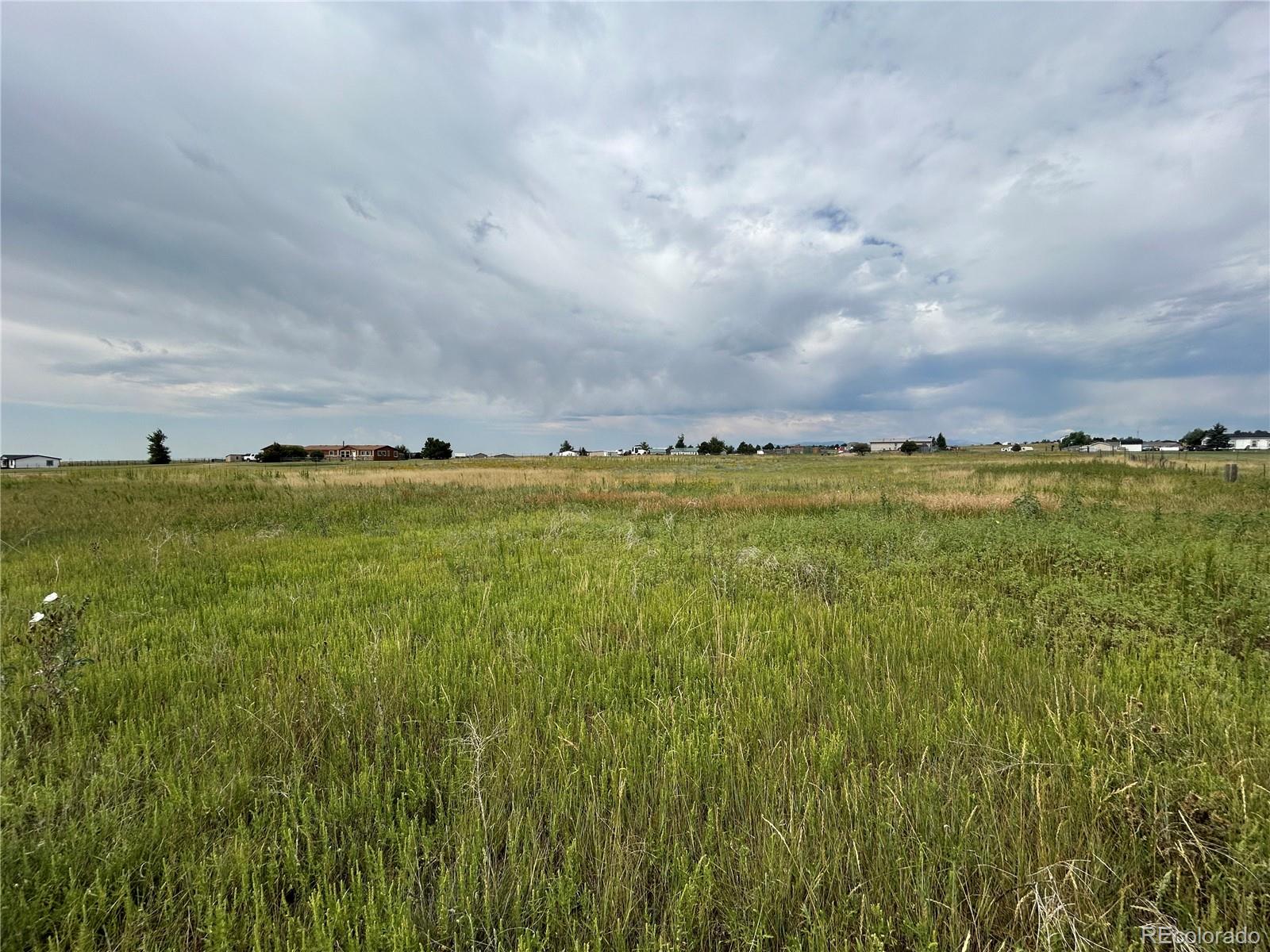 3640 Murr Road Peyton, CO 80831 - Photo 14 of 22 a view of a large body of water and lots of trees