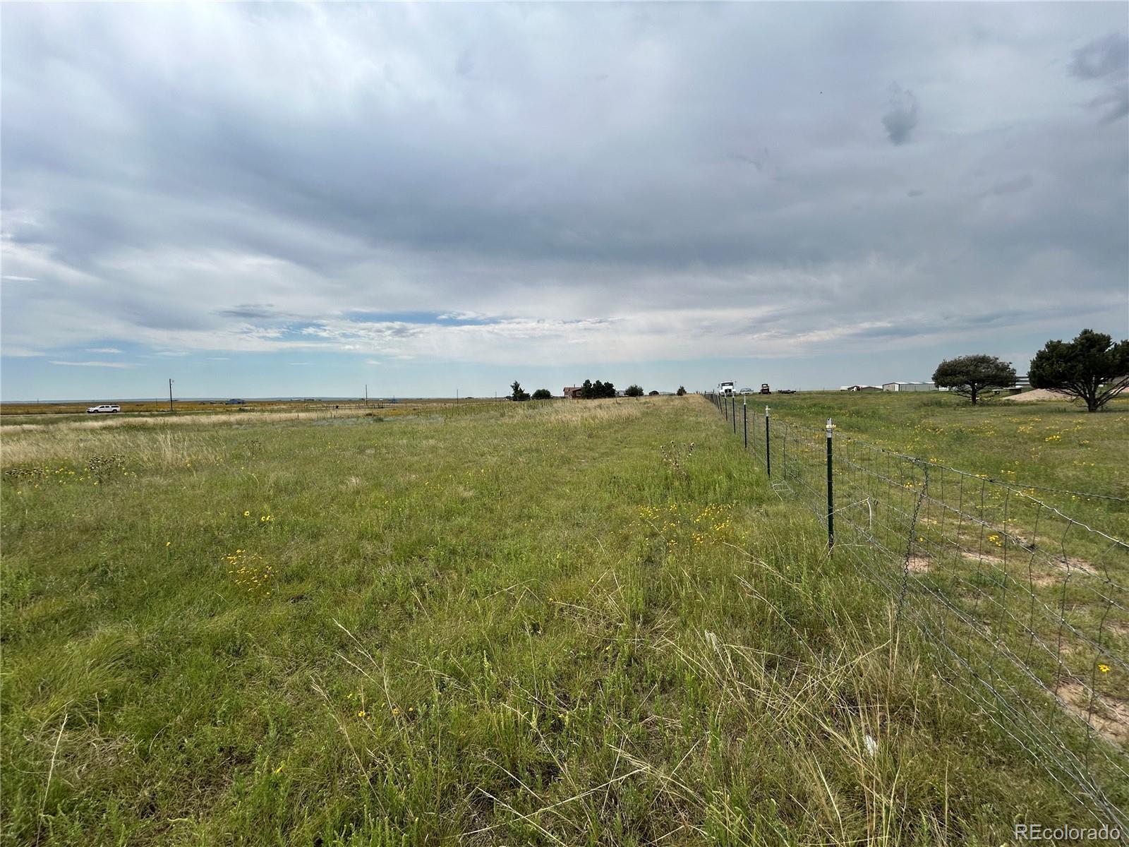 3640 Murr Road Peyton, CO 80831 - Photo 15 of 22 a view of an ocean and beach