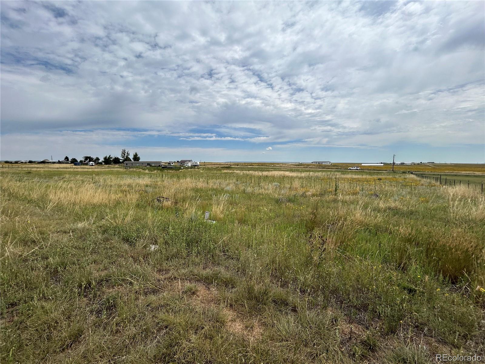 3640 Murr Road Peyton, CO 80831 - Photo 18 of 22 a view of an ocean and beach
