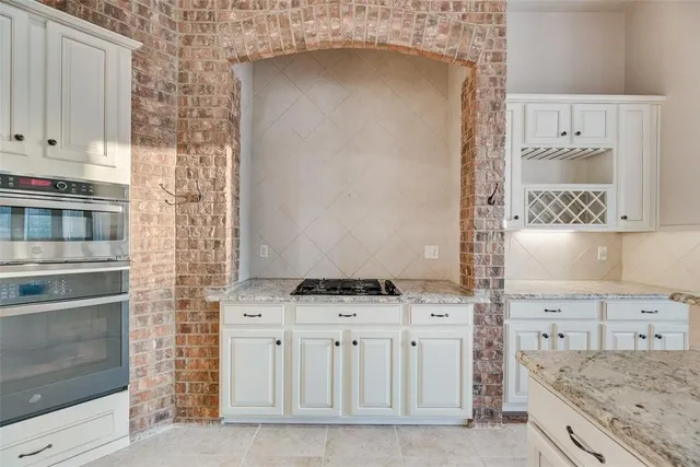 a view of cabinets and window