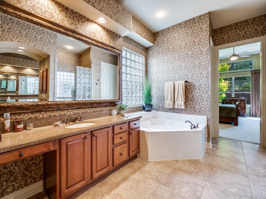 6470 Hunters Parkway Frisco, TX 75035 - Photo 21 of 40 Bathroom with ensuite bath, vanity, wallpapered walls, a bath, and a stall shower