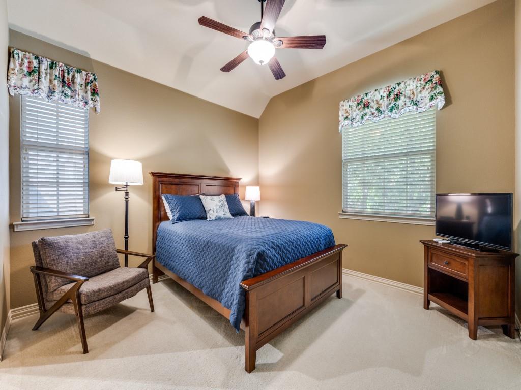 6470 Hunters Parkway Frisco, TX 75035 - Photo 27 of 40 Carpeted bedroom with multiple windows, a ceiling fan, and vaulted ceiling