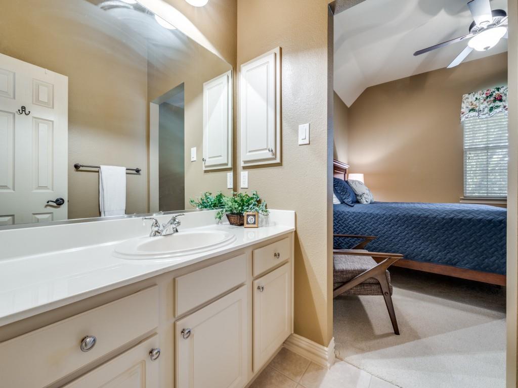 6470 Hunters Parkway Frisco, TX 75035 - Photo 29 of 40 Bathroom with connected bathroom, vanity, light tile patterned floors, a ceiling fan, and lofted ceiling