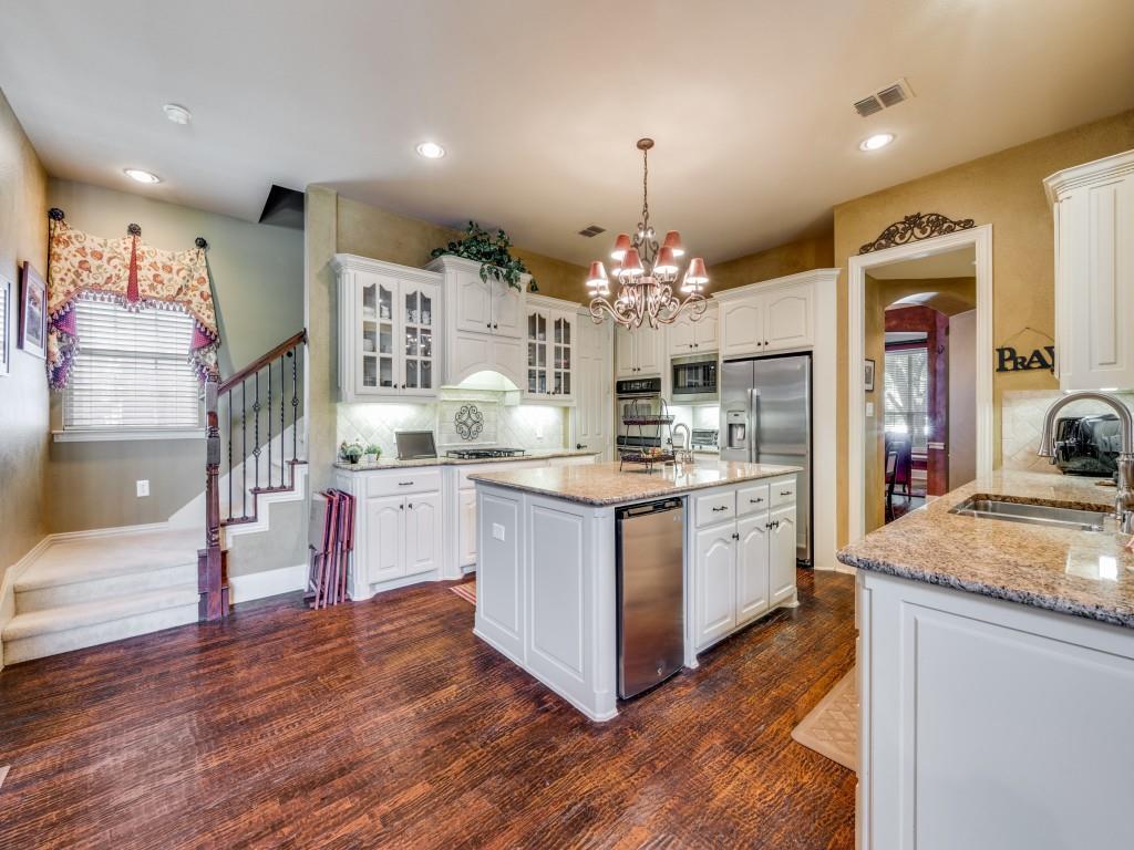 6470 Hunters Parkway Frisco, TX 75035 - Photo 4 of 40 Kitchen featuring white cabinets, pendant lighting, dark wood finished floors, and recessed lighting