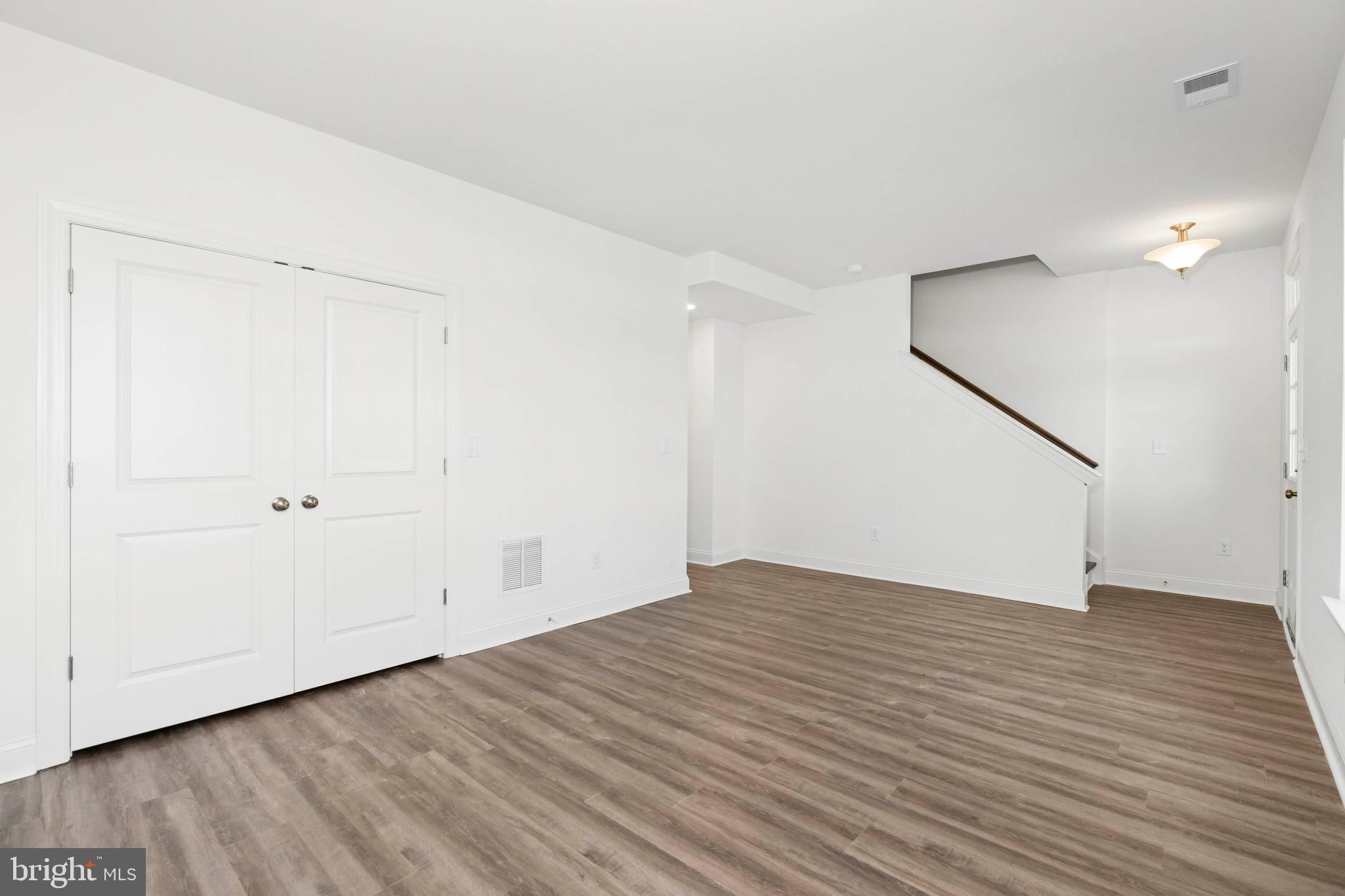 840 Mapleton Avenue, Unit 204 Middletown, DE 19709 - Photo 18 of 25 wooden floor in an empty room