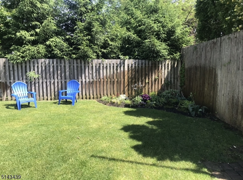 1 Union Avenue, Unit 3 Madison, NJ 07940 - Photo 11 of 12 a view of backyard with wooden fences
