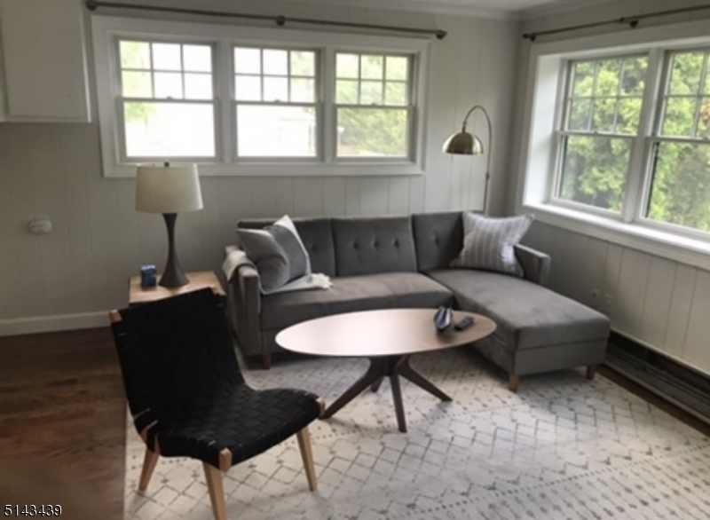 1 Union Avenue, Unit 3 Madison, NJ 07940 - Photo 5 of 12 a living room with furniture and a window