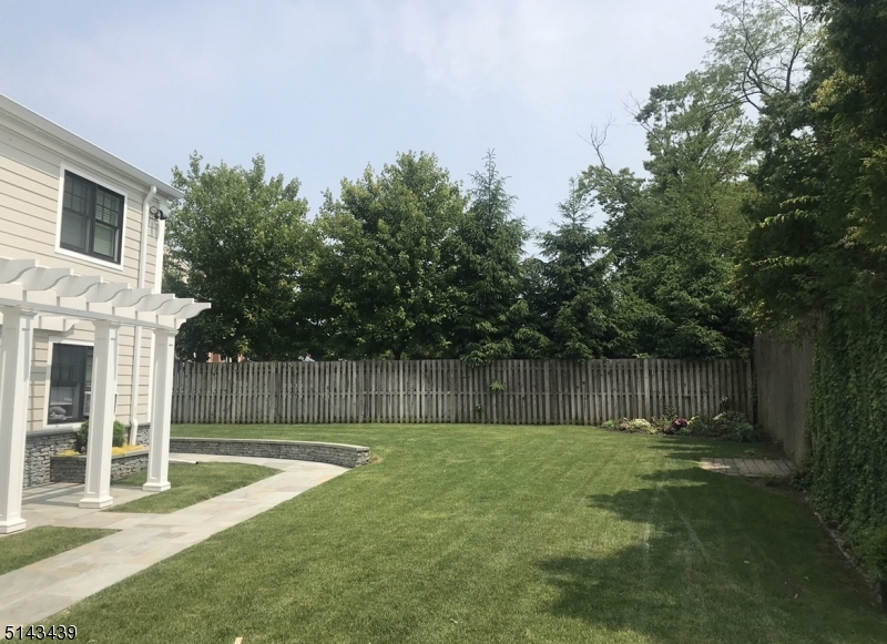 1 Union Avenue, Unit 3 Madison, NJ 07940 - Photo 10 of 12 a swimming pool with outdoor seating and yard