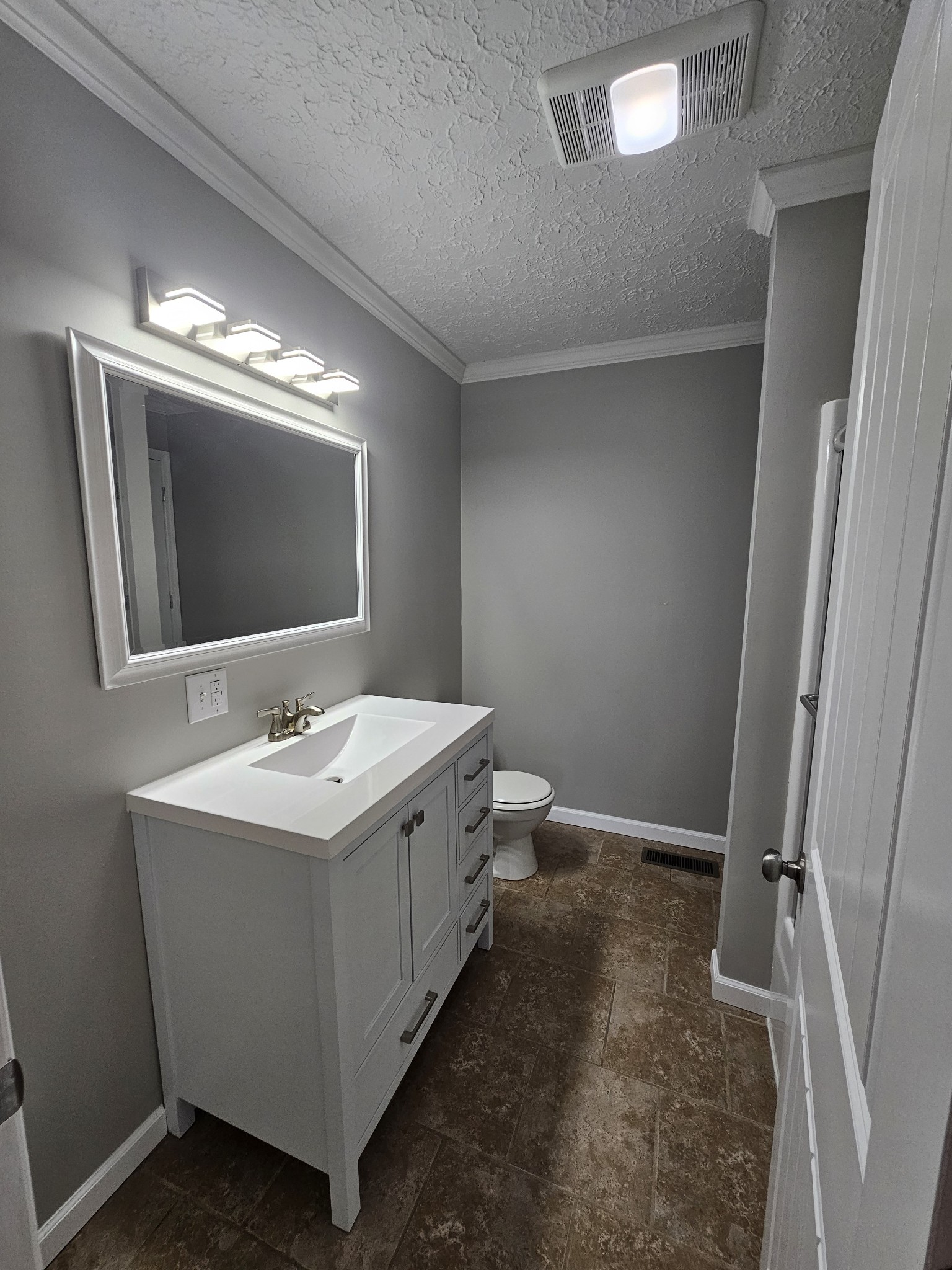 362 Forest Point Road Monteagle, TN 37356 - Photo 36 of 42 a bathroom with a double vanity sink and mirror