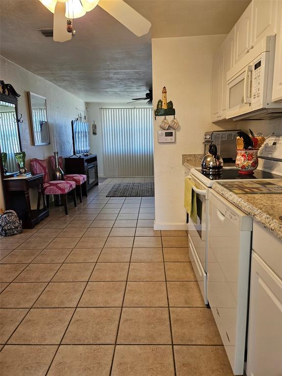 37 Rivershore Drive Ormond Beach, FL 32176 - Photo 13 of 36 a kitchen with a sink and cabinets