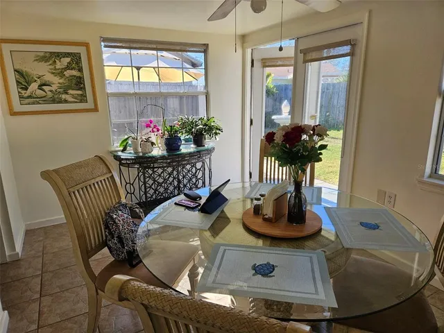 a view of a livingroom with furniture and window
