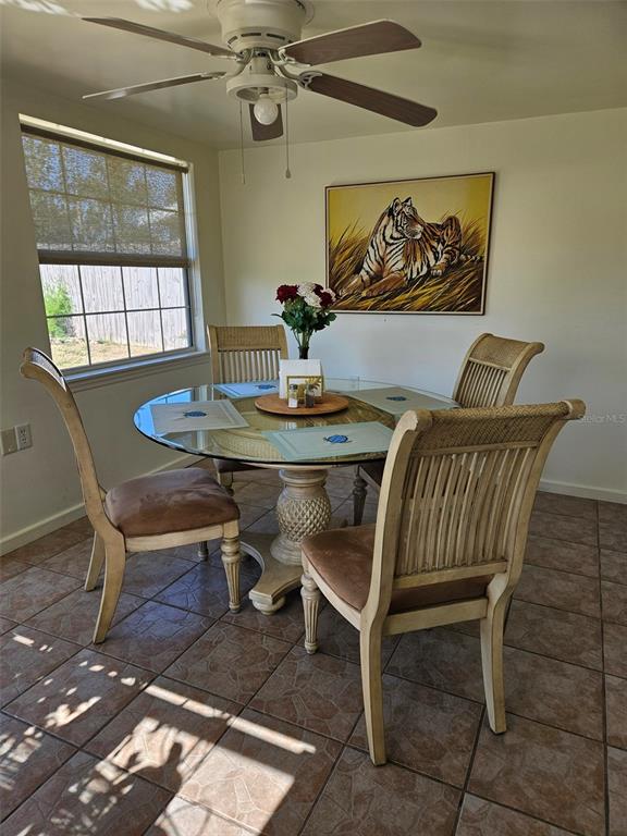 37 Rivershore Drive Ormond Beach, FL 32176 - Photo 16 of 36 a dining room with furniture and window