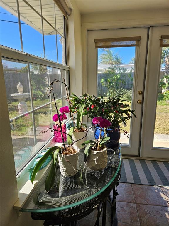 37 Rivershore Drive Ormond Beach, FL 32176 - Photo 17 of 36 a view of a dining room with furniture and a potted plant