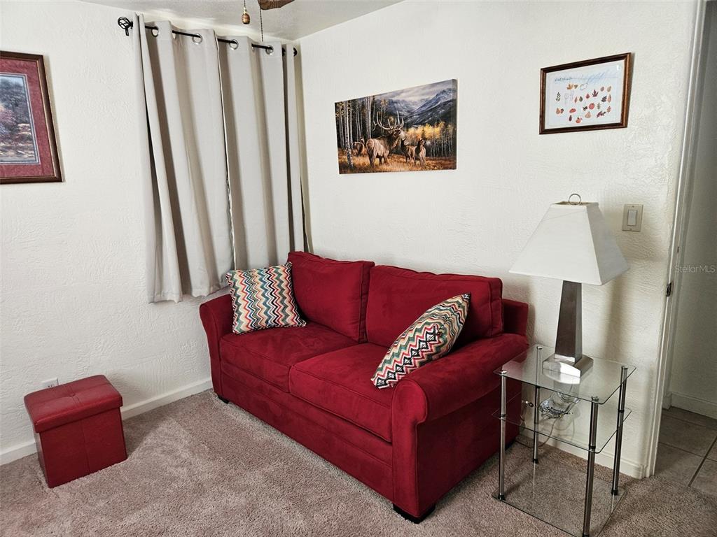 37 Rivershore Drive Ormond Beach, FL 32176 - Photo 23 of 36 a living room with furniture and a window