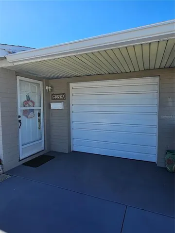 a view of a park with palm trees