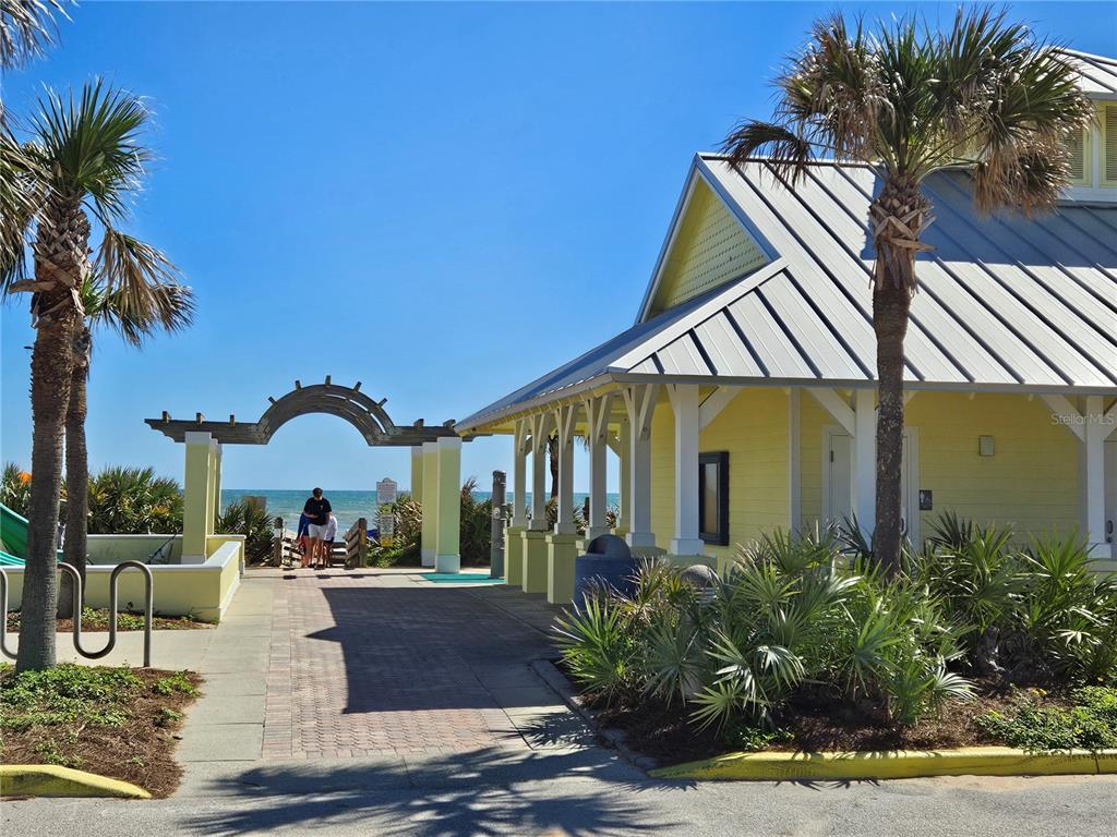 37 Rivershore Drive Ormond Beach, FL 32176 - Photo 34 of 36 a front view of a house with garden and patio