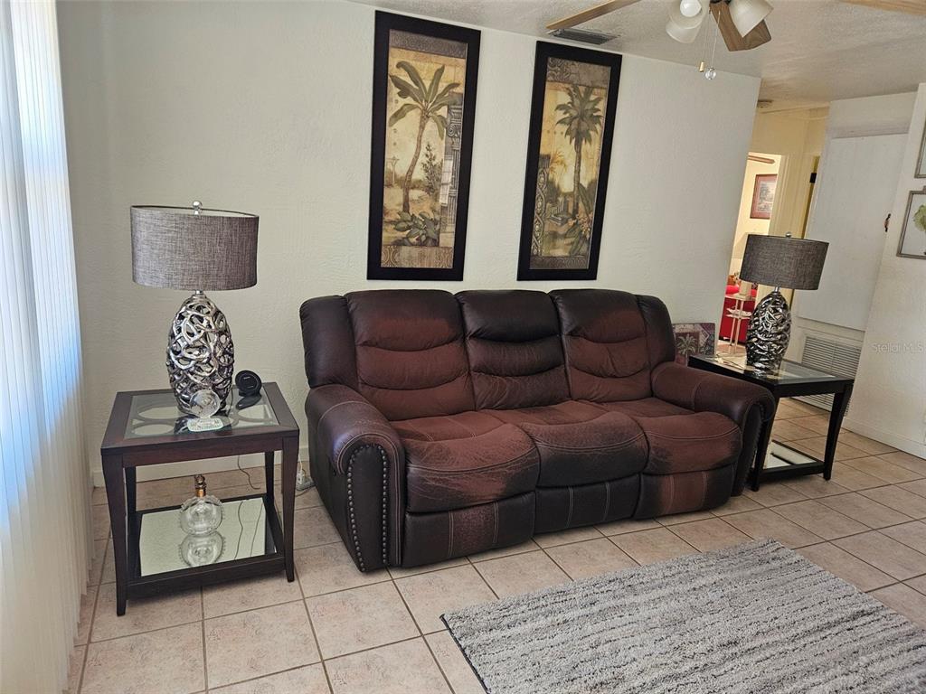 37 Rivershore Drive Ormond Beach, FL 32176 - Photo 5 of 36 a living room with furniture and a window
