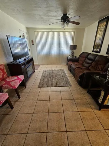 a kitchen with a refrigerator a washer and dryer
